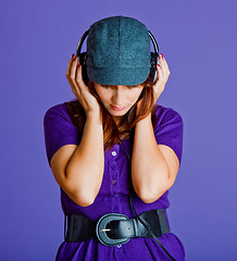 Image showing Beautiful woman listening music