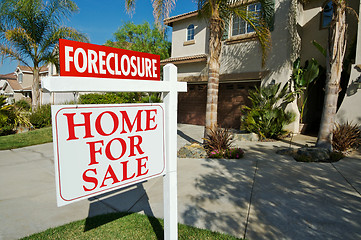 Image showing Foreclosure For Sale Real Estate Sign and House