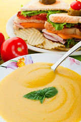Image showing Yellow soup and sandwich