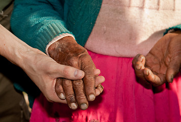 Image showing Old Woman and Young Man