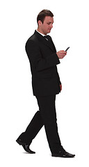 Image showing Businessman checking the mobile phone