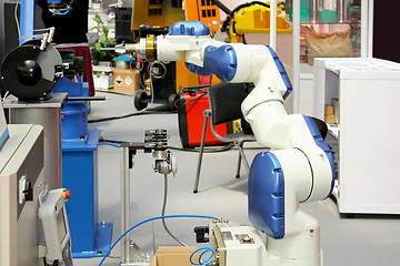 Image showing White robotic arm