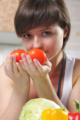 Image showing Woman with tomatoes