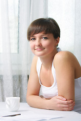 Image showing Woman at table