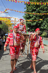 Image showing Tribal parade w sedan chair Philippines