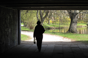 Image showing Female walking at springtime