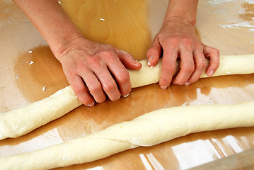 Image showing Preparing rolled pastry