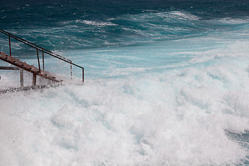 Image showing Stairs and storm sea foam