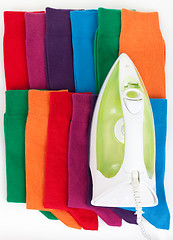 Image showing Iron and different color socks