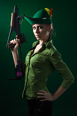 Image showing Robin hood style woman with crossbow