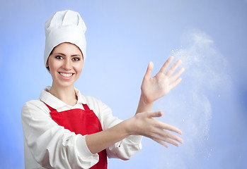 Image showing Chef shake off flour