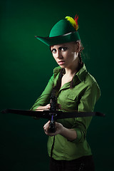 Image showing Serious woman with crossbow