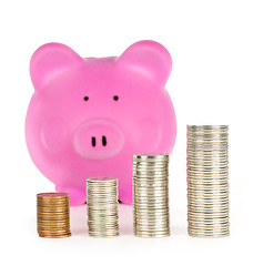 Image showing Piggy bank with coin stacks