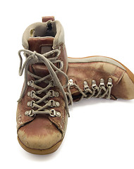 Image showing Old red boots