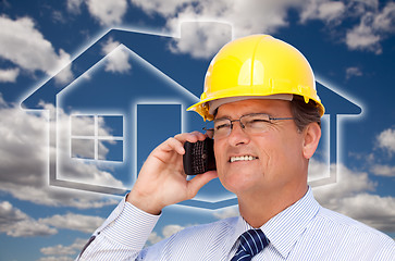 Image showing Contractor in Hardhat on Phone Over House Icon and Blurry Clouds