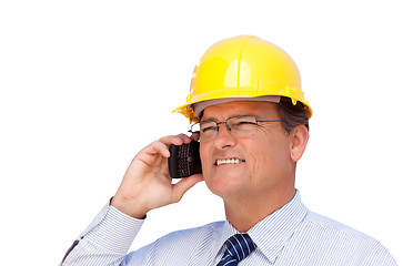 Image showing Contractor in Hardhat on His Cell Phone Isolated