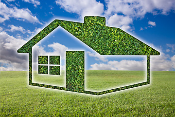 Image showing Green Grass House Icon Over Field, Sky and Clouds