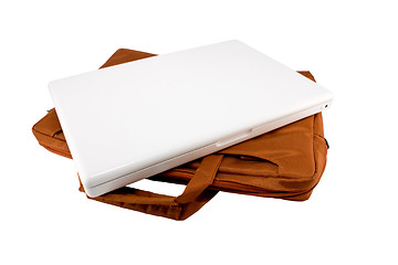 Image showing Orange bag and white laptop