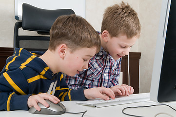 Image showing Boys on a computer