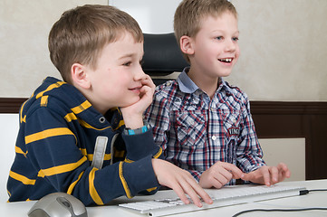 Image showing Boys on a computer
