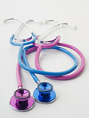 Image showing pink and blue stethoscopes