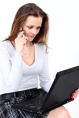 Image showing Sales manager with notebook and mobile phone on white background