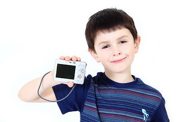 Image showing small boy with digital camera on white background