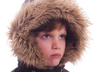 Image showing Cute boy with a furry hood