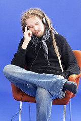 Image showing Man listens to music