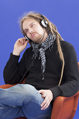 Image showing Man listens to music