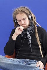 Image showing Man listens to music