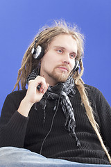 Image showing Man listens to music