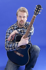 Image showing Portrait Of A Man With Guitar