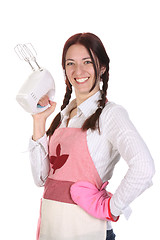 Image showing beautiful housewife with electric beater 