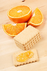 Image showing Biscuits, marmalade and orange