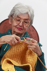 Image showing Old woman knitting