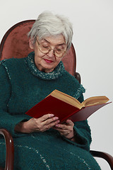 Image showing Old woman reading