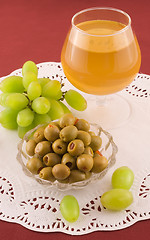 Image showing Fresh grapes and cheese with with white mold
