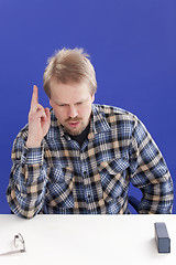 Image showing Man Points Out His Opinion