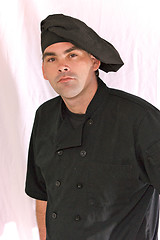 Image showing male chef in black uniform