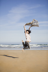 Image showing pretty happy girl jumping