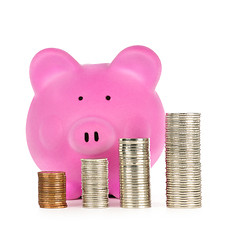 Image showing Piggy bank with coin stacks