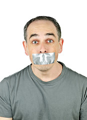 Image showing Man with duct tape on mouth