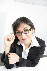 Image showing Businesswoman leaning on sofa