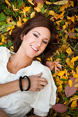 Image showing Happy beautiful autumn woman