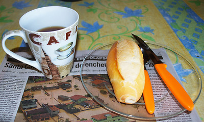 Image showing Breakfast and newspaper