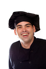 Image showing happy laughing chef in black