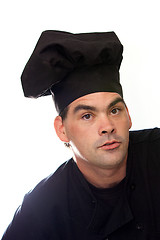 Image showing male chef in black hat and coat
