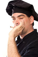 Image showing male chef in black smoking