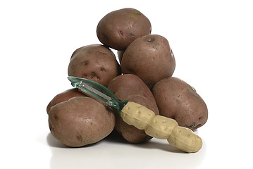 Image showing Peeling Potatoes